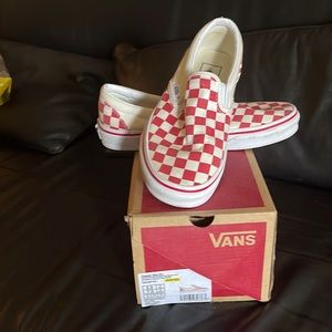 Red checkered vans.